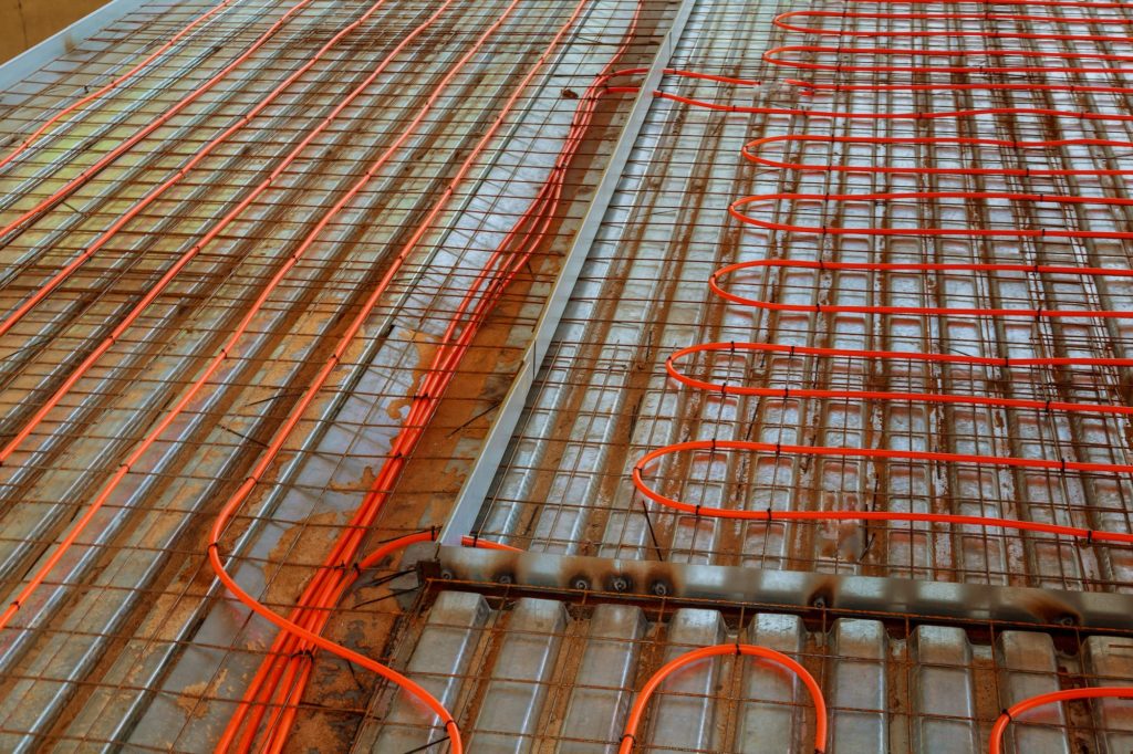 New floor heating system Pipes and heating system at house construction site